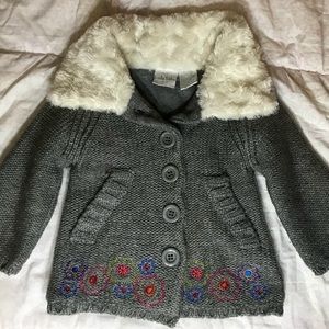 Jacket with faux fur around collar